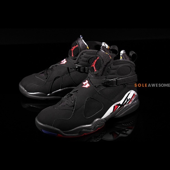 black jordans with colorful bottom